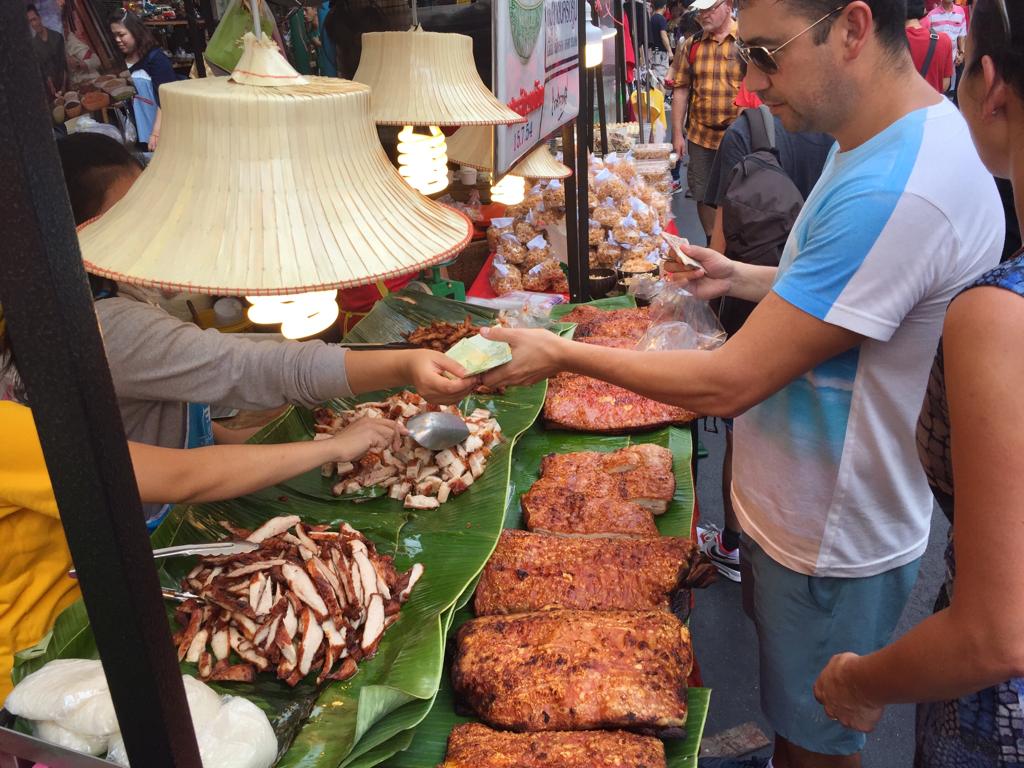 Street food crispy pork in Chinatown Bangkok